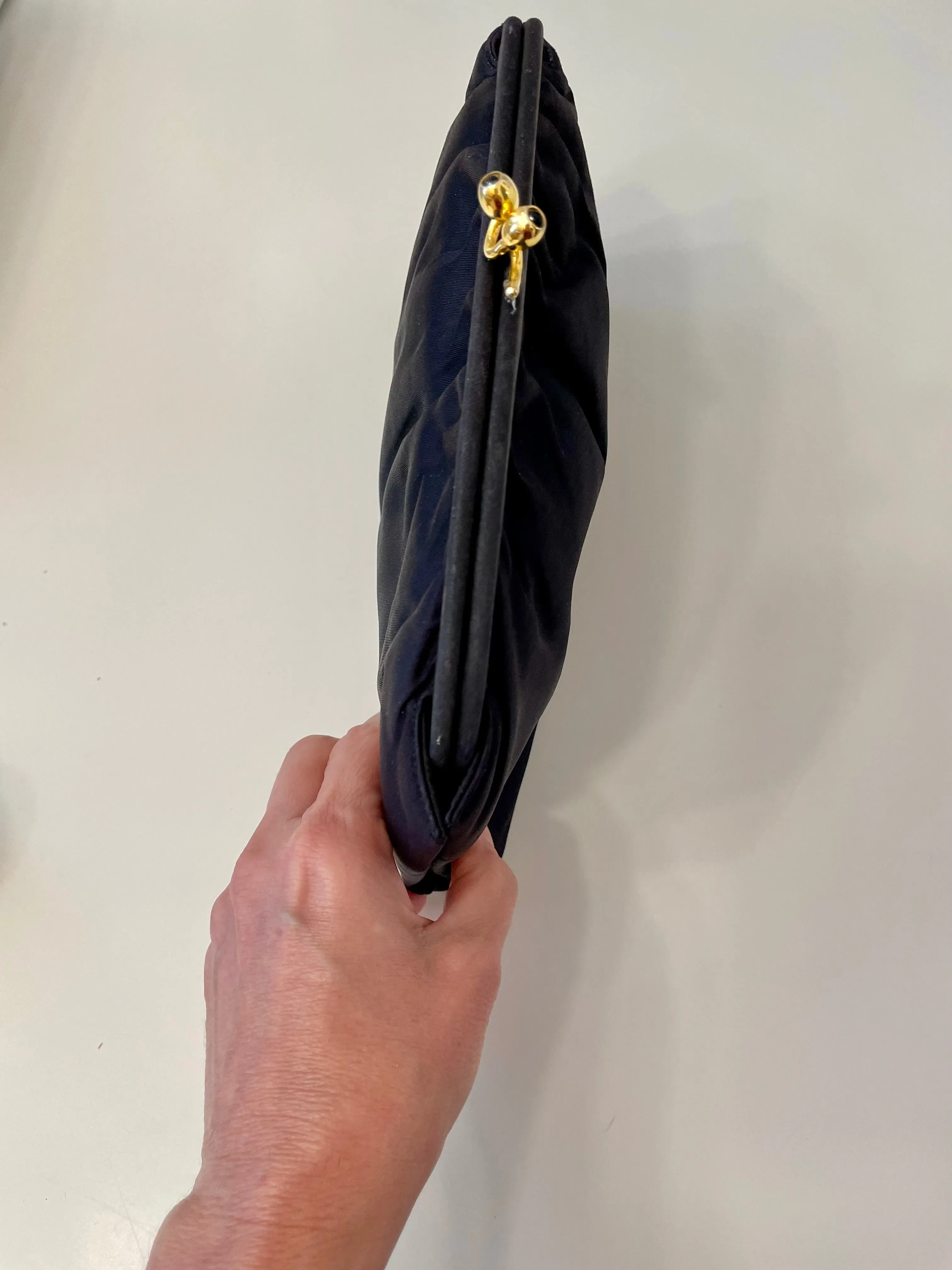 The Socialite and her love of the classic noir satin evening bag... this one is absolutely elegant!
